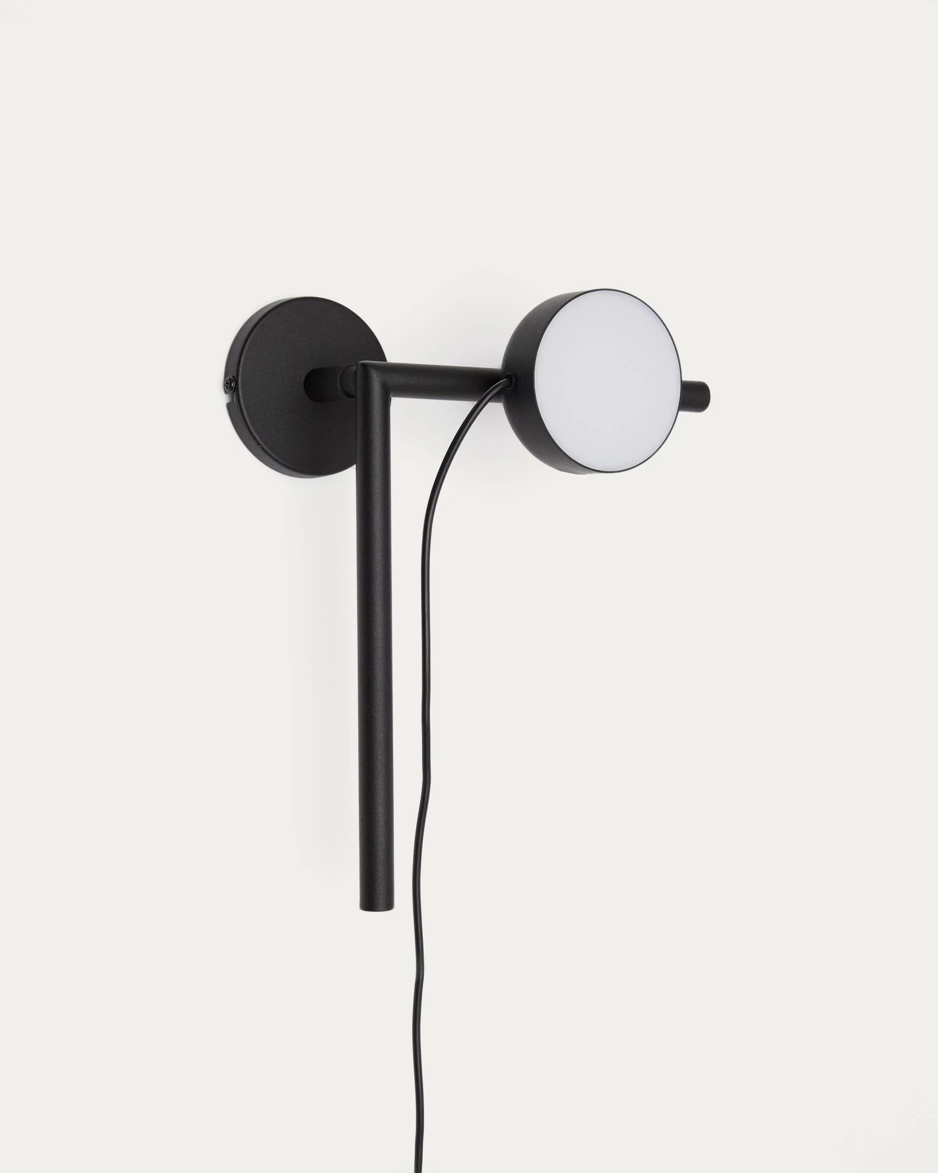Orey black metal wall-mounted light fixture with multi-position spotlight