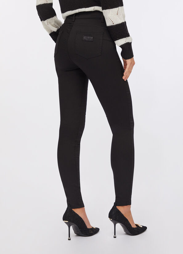 Pantaloni skinny con pietre gioiello