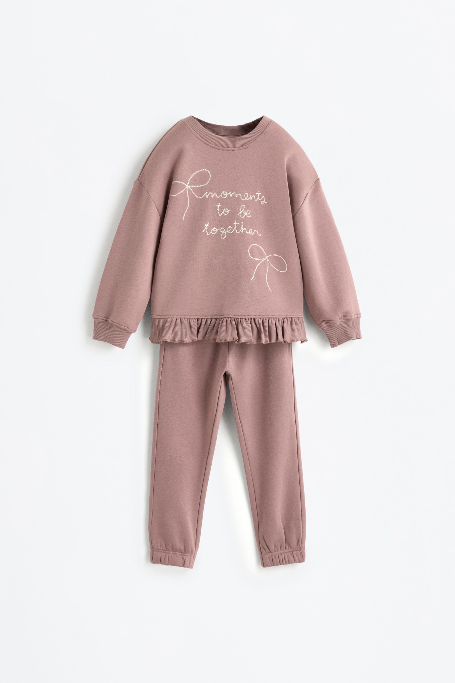 Conjunto sudadera volante y pantalón
