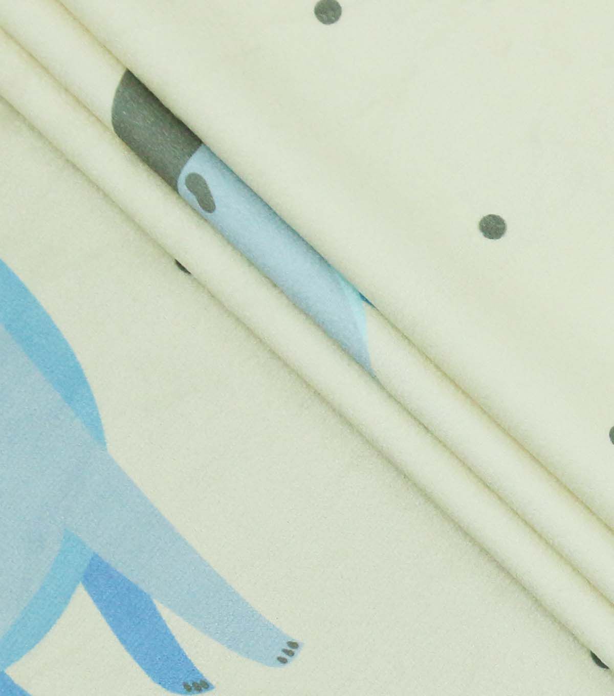 Dinosaurs on Cream With Dots Soft & Minky Fleece Fabric