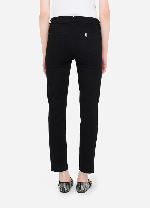 Pantaloni in tessuto spalmato