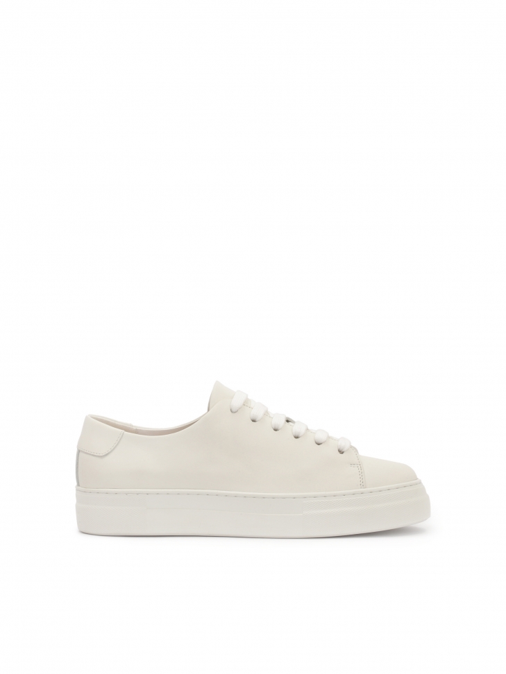 White leather sneakers with a simple upper