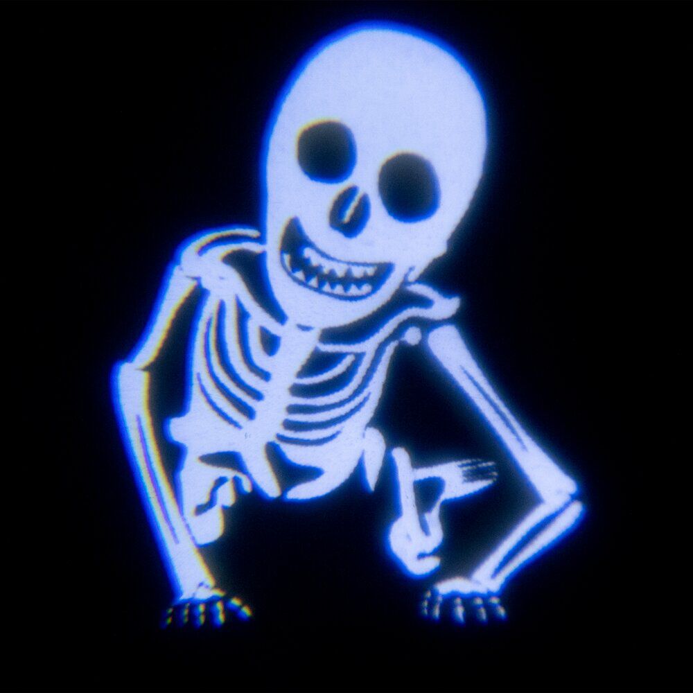 Projecteur lumineux Halloween squelette dansant 11x11,5x18cm