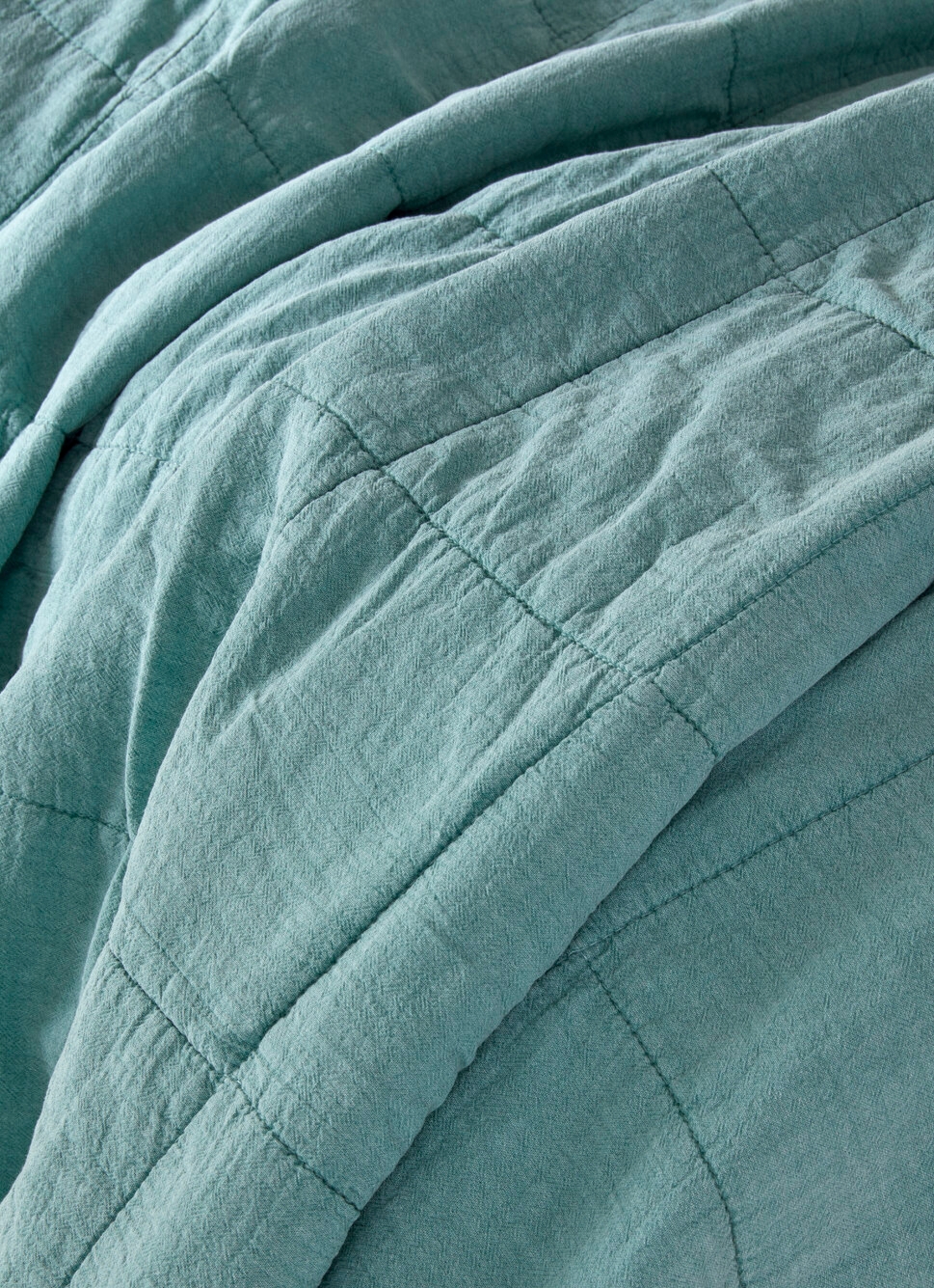 BOUT DE LIT MATELASSÉ UNI LAGON