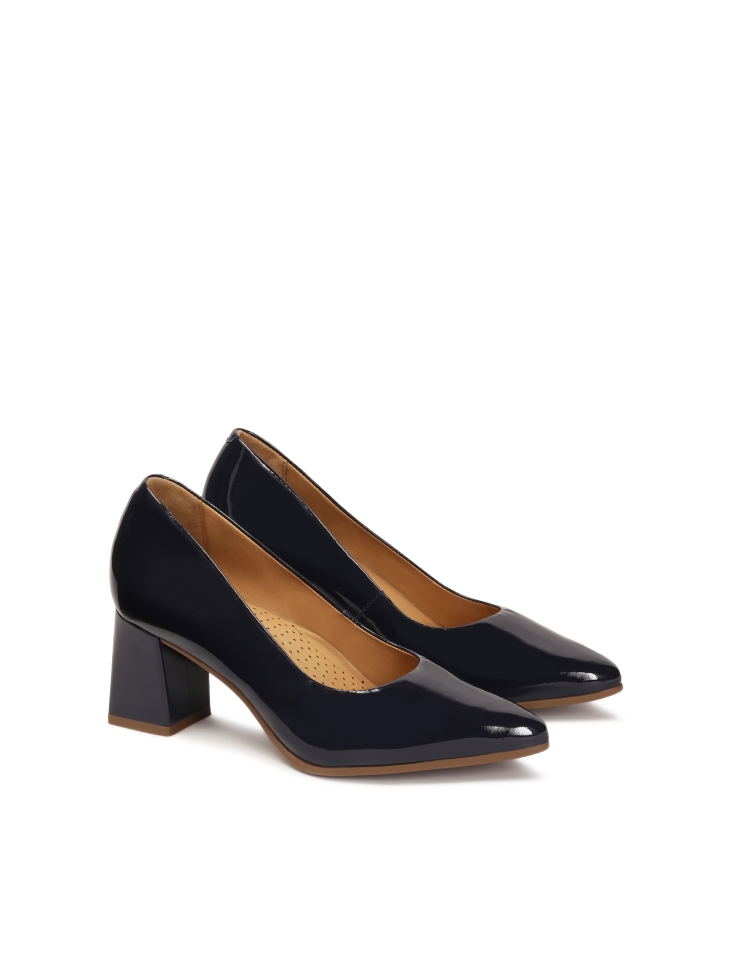 Patent leather navy blue pumps on a post