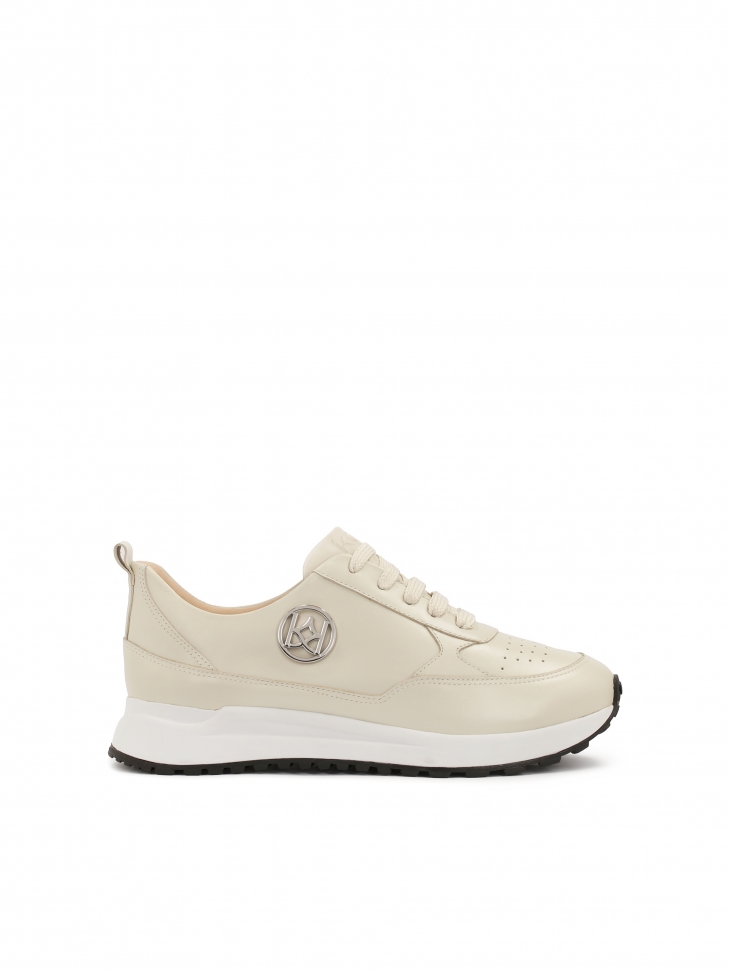 Comfortable sneakers decorated with a silver monogram