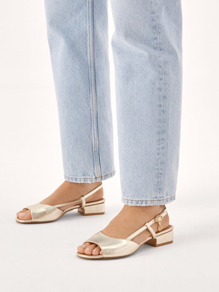 Elegant gold sandals with heel strap