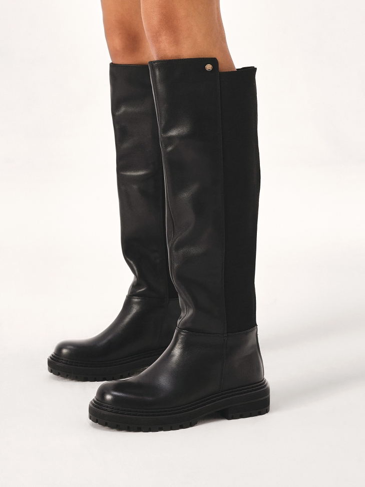 Black boots with slip-on upper on trep sole