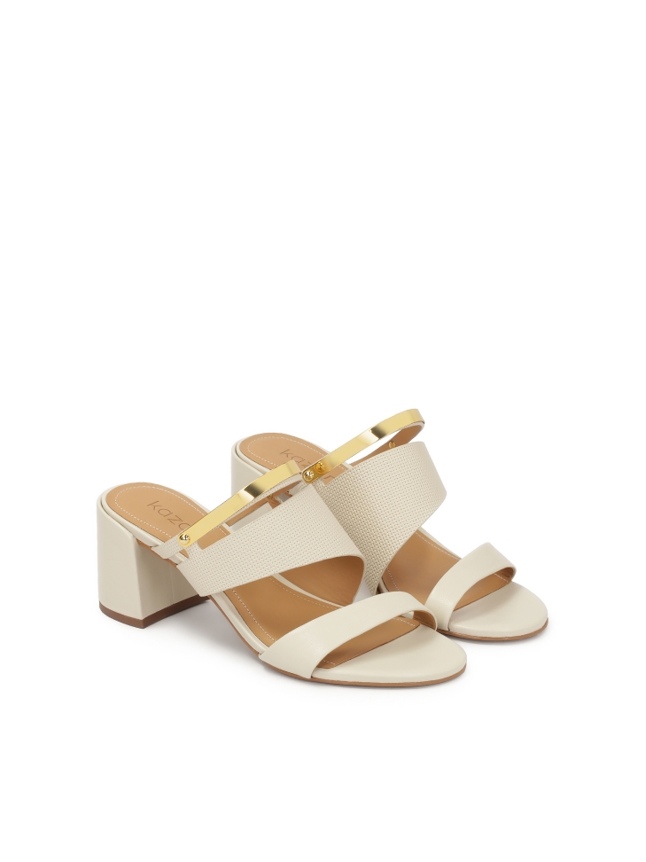 Heeled mules with metal strap decoration