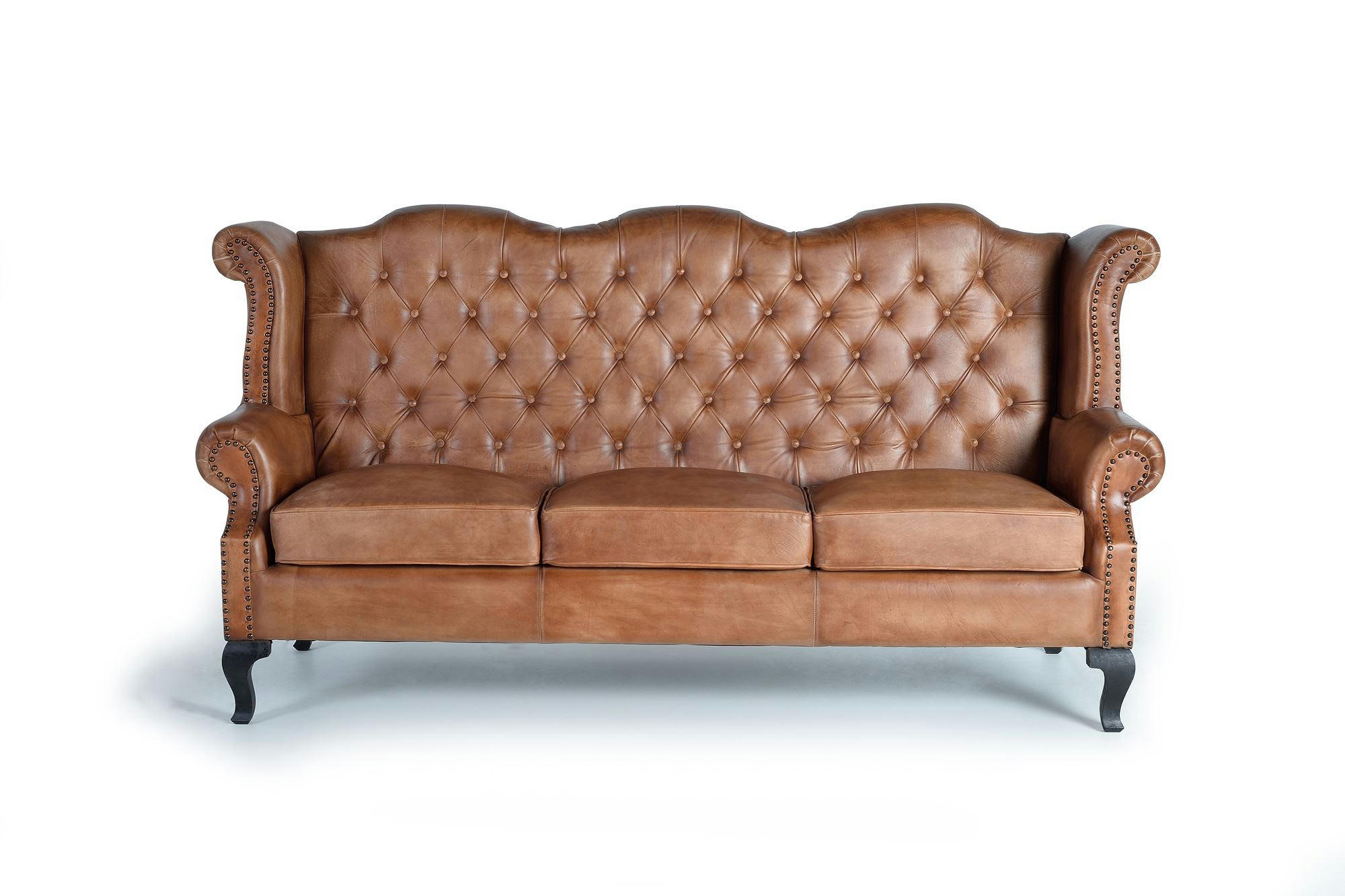 - Canapé rembourré en cuir naturel.