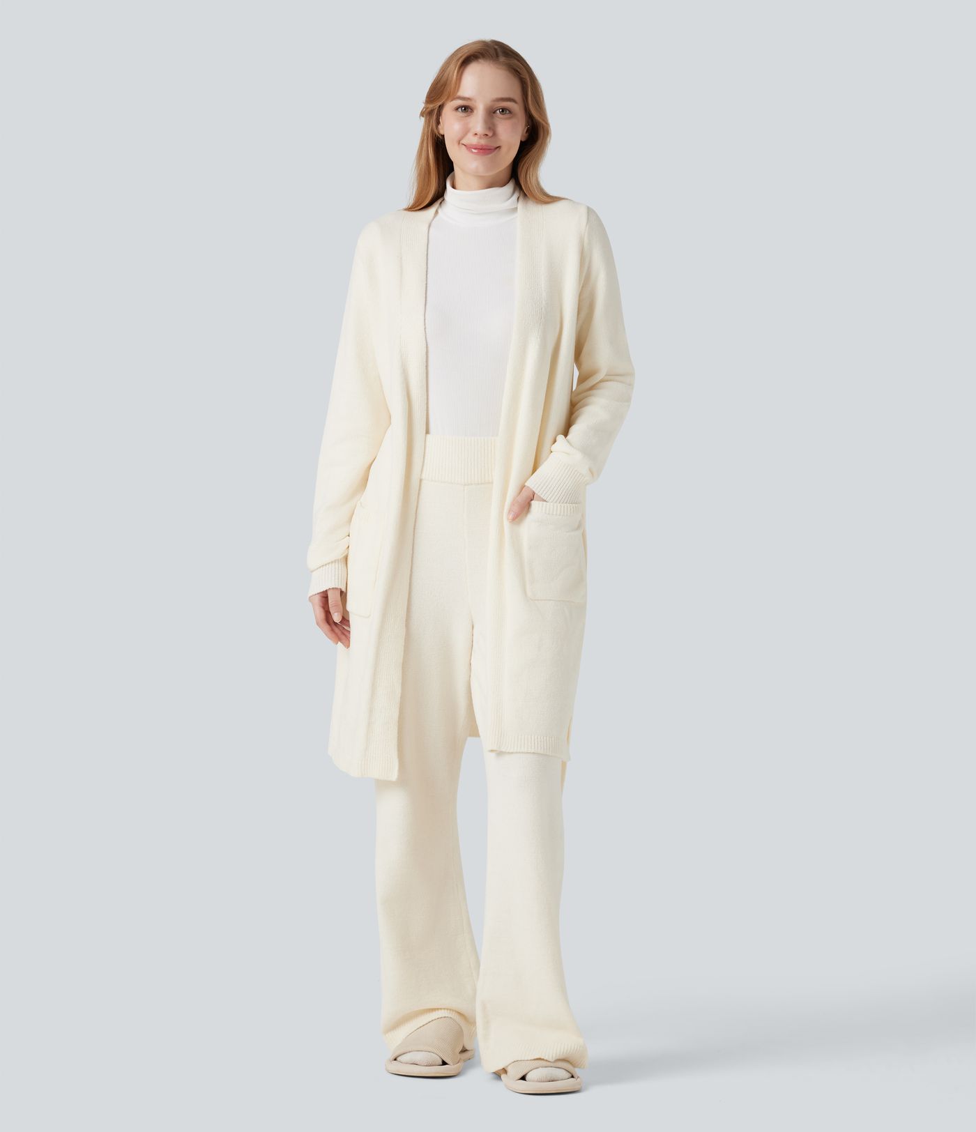 Robe d'intérieur longue tricot ouverte ceinturée manches longues avec poches