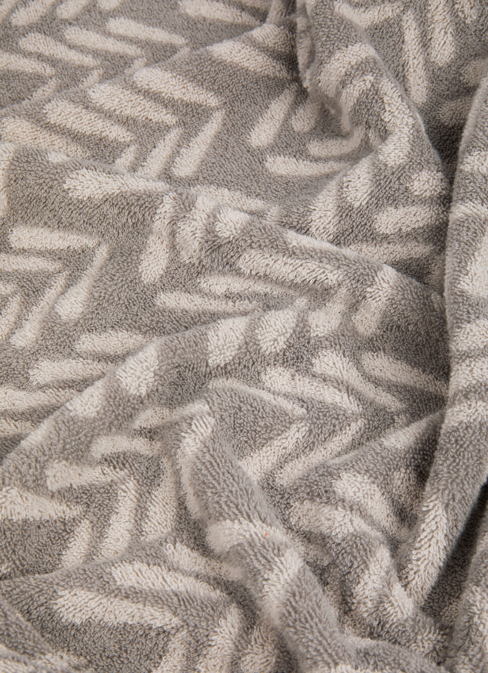 SERVIETTE INVITÉ JACQUARD MOTIF ABSTRAIT GRIS