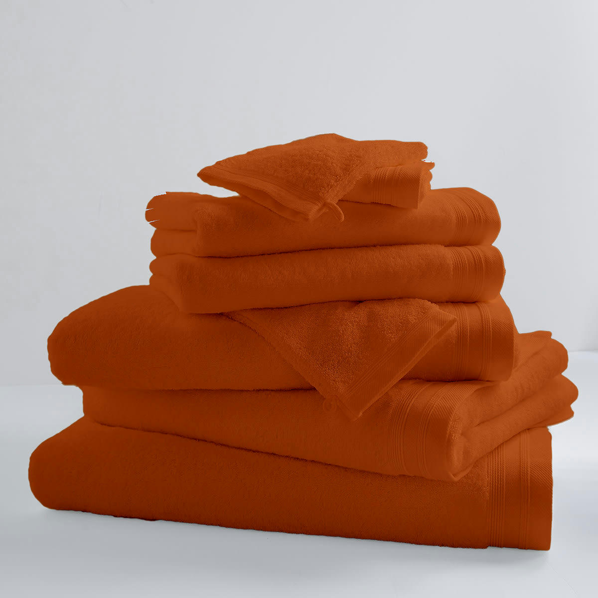 - Lot de 2 serviettes de toilette unies et colorées coton papaye 100x50