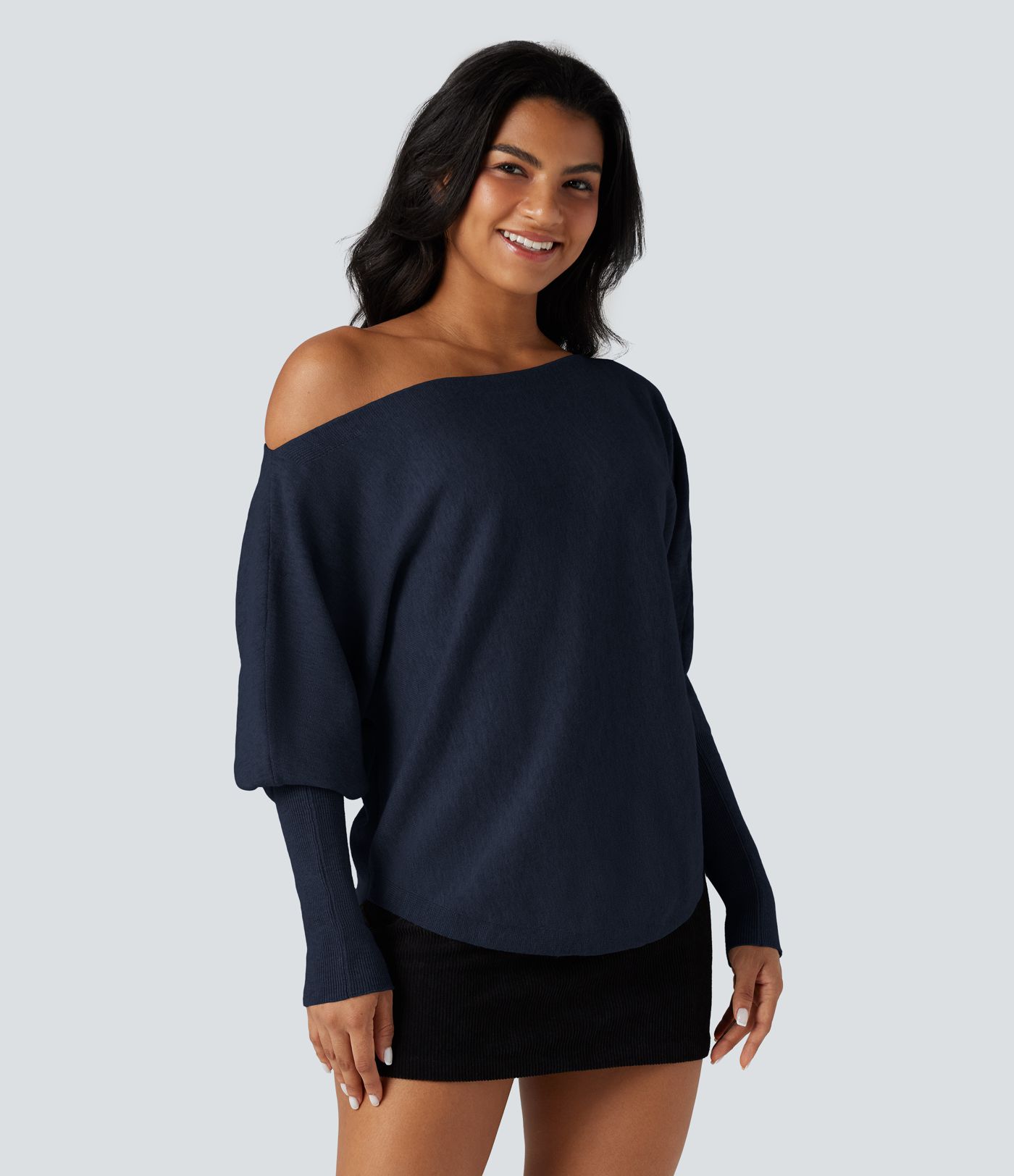 Pull une épaule manches chauve-souris ourlet arrondi