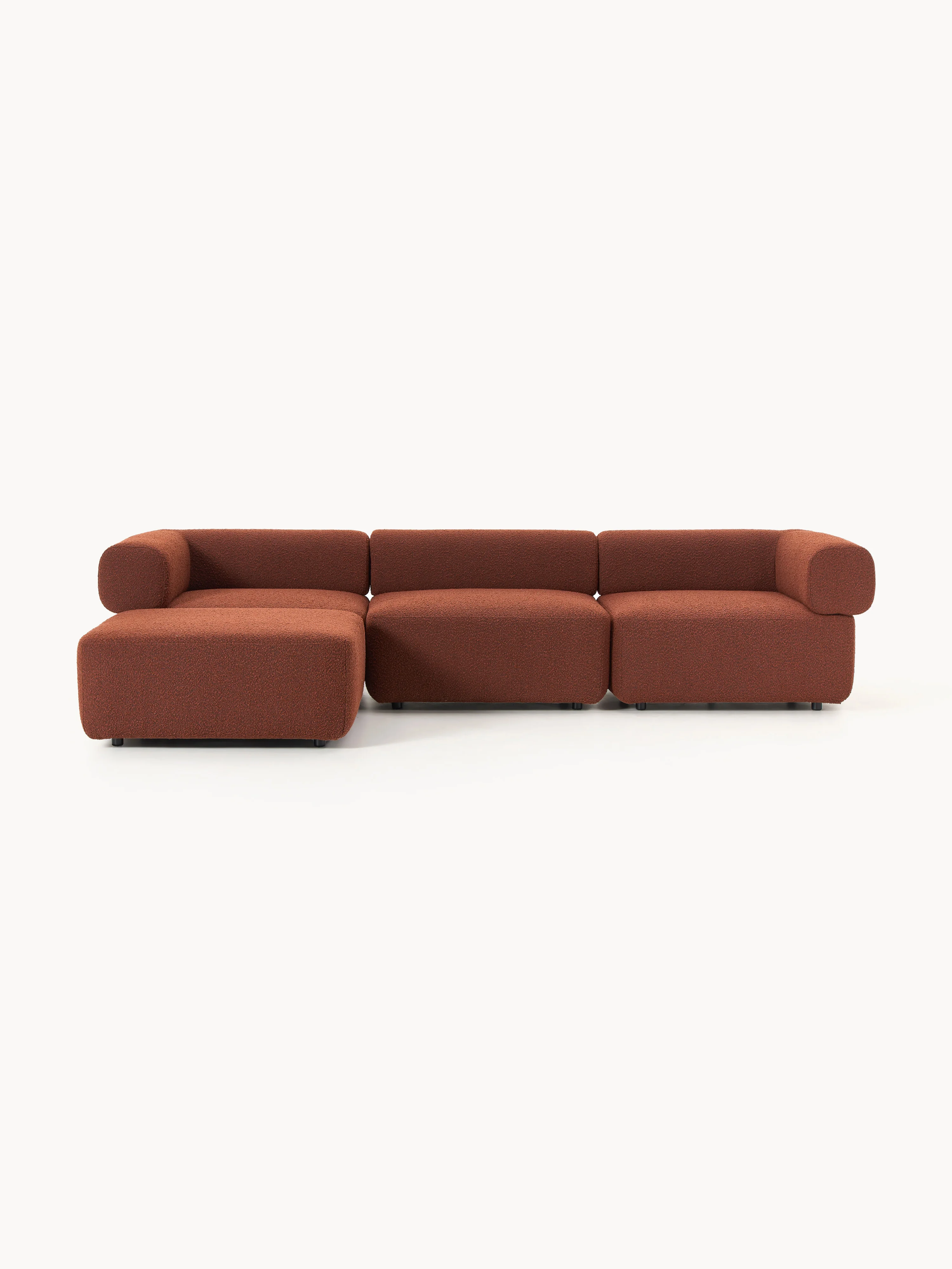 Modulares Bouclé-Sofa Anton (4-Sitzer) mit Hocker (links/rechts)