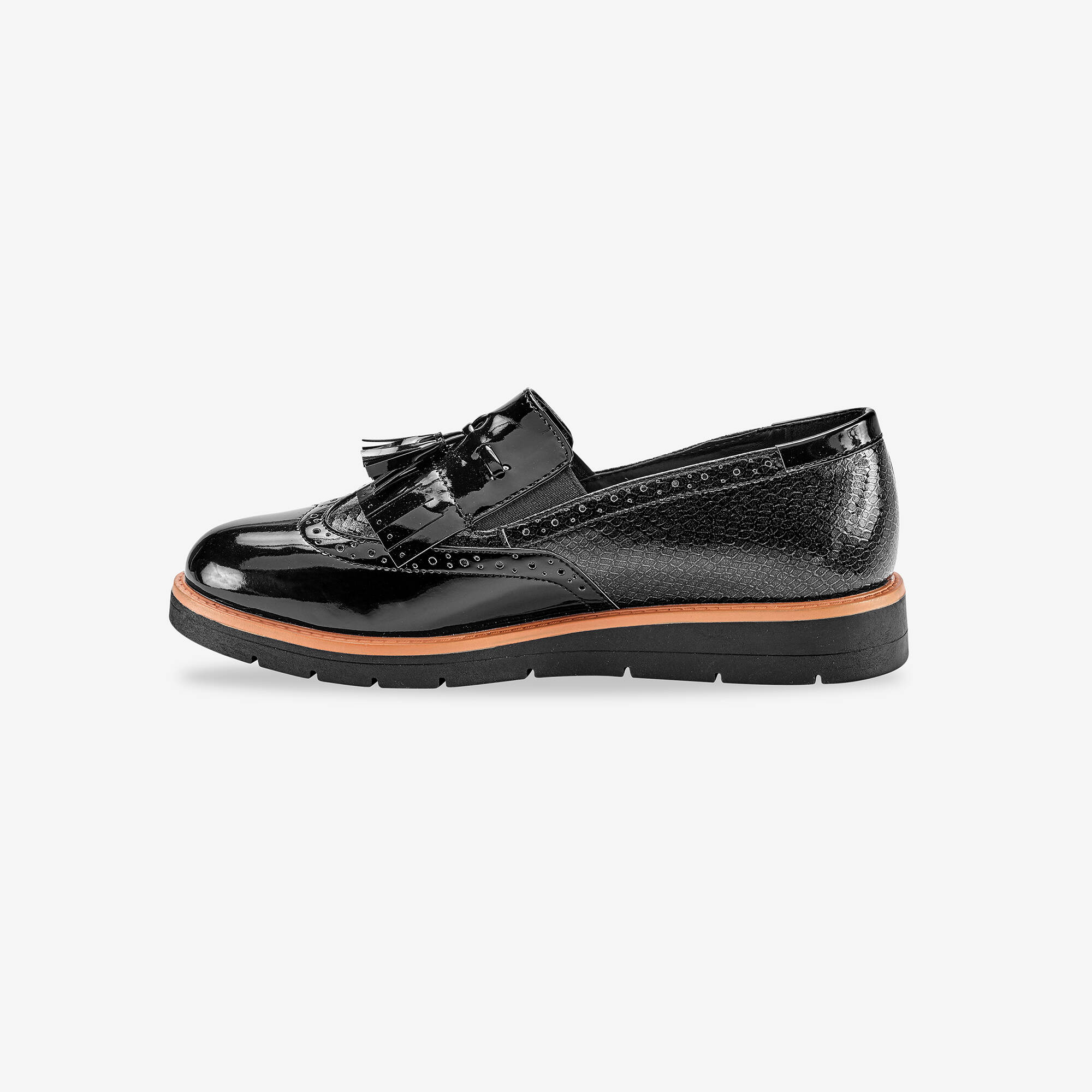 Mocassins compensés à franges et pompons