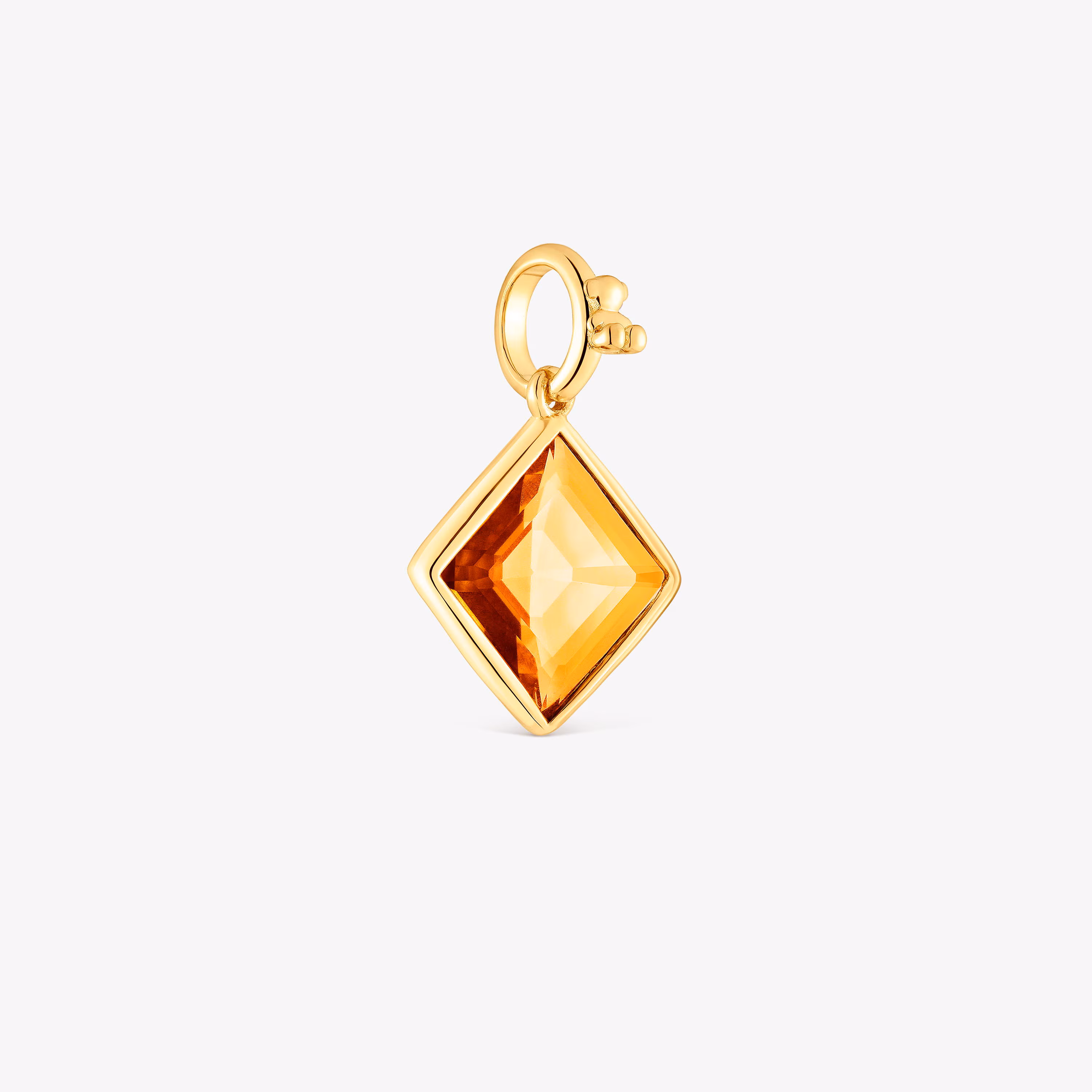 Colgante pequeño con baño de oro 18 kt sobre plata y citrino Medallions