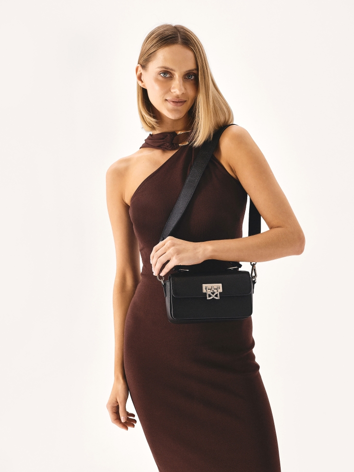 Black handbag with rigid regular form