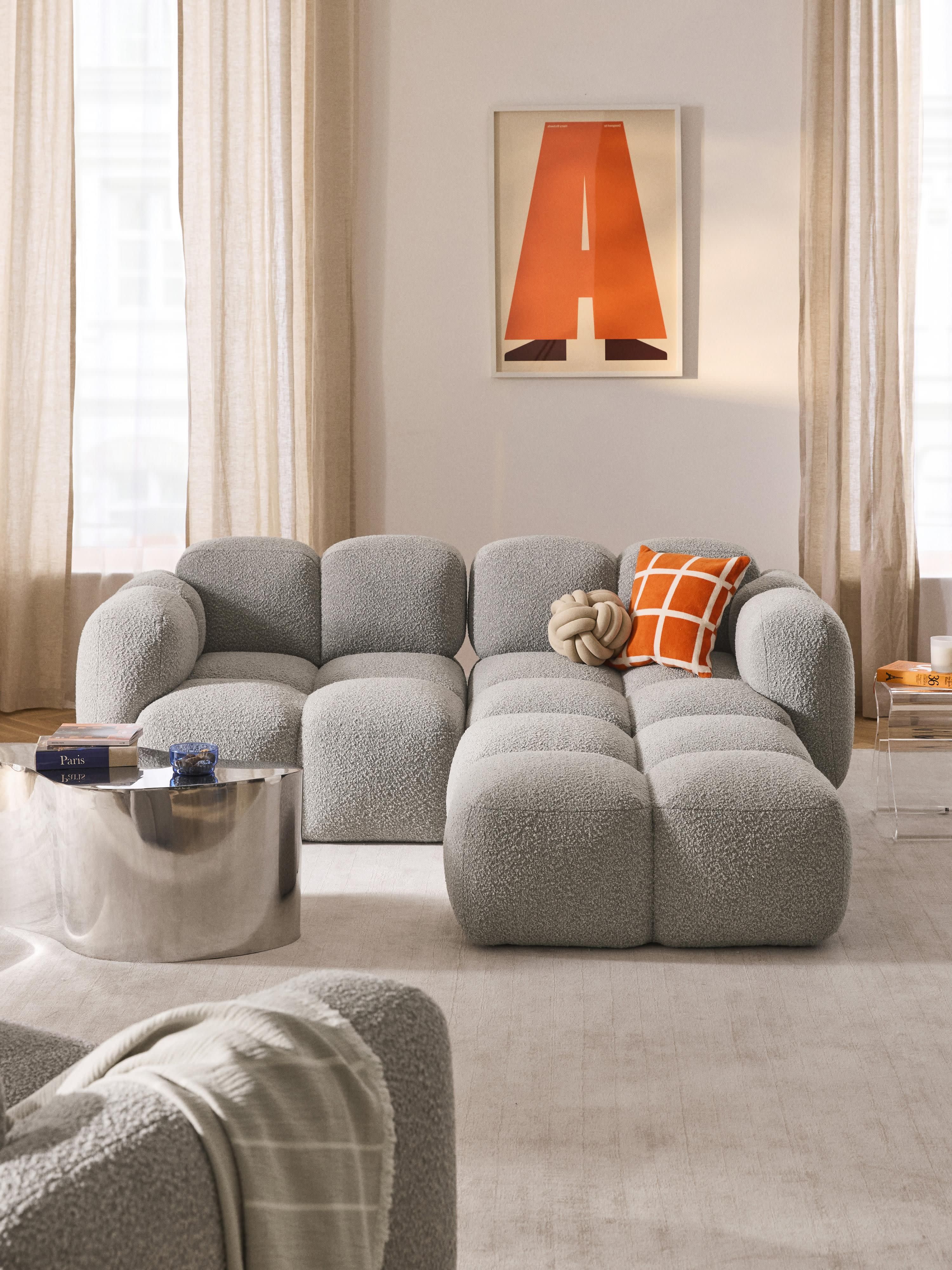 Modulares Sofa Tayla (3-Sitzer) aus Bouclé mit Hocker (links/rechts)