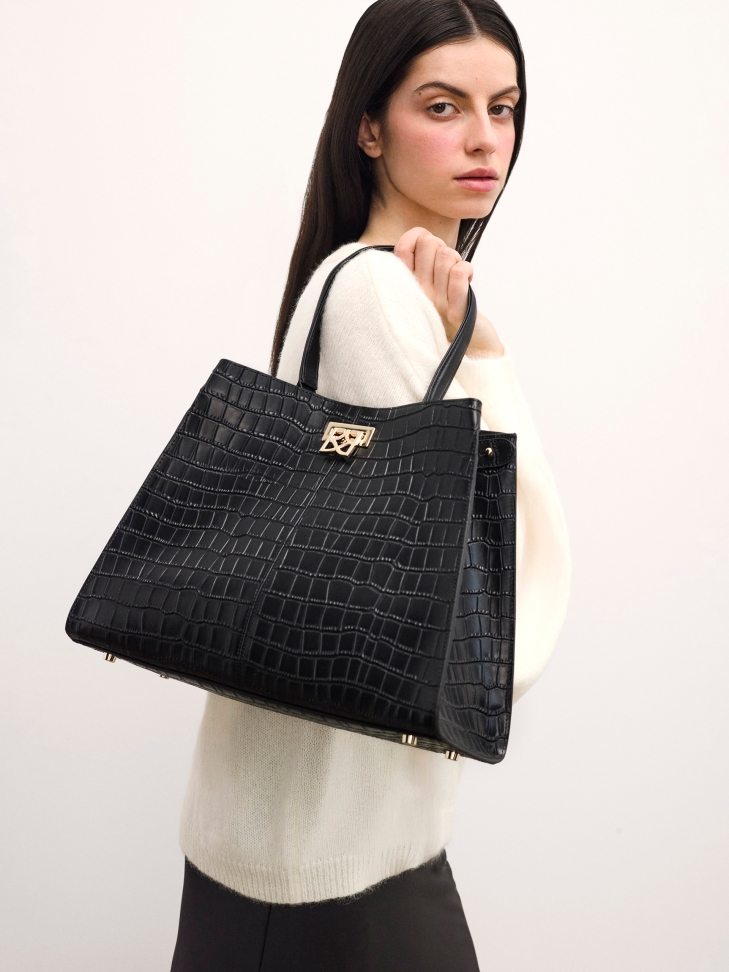 Black embossed leather handbag