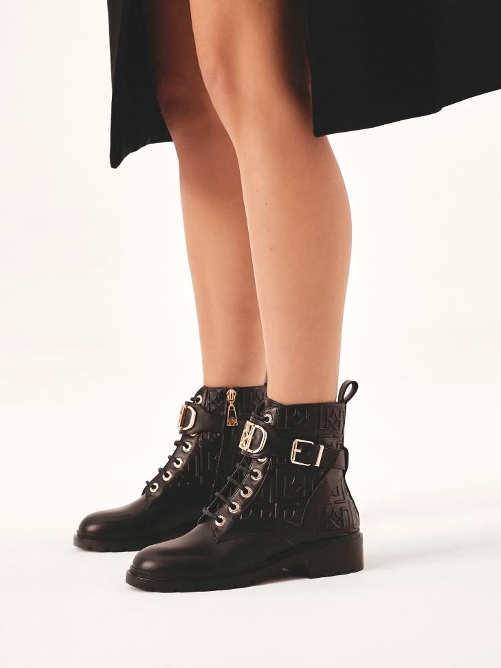 Monogram-decorated boots