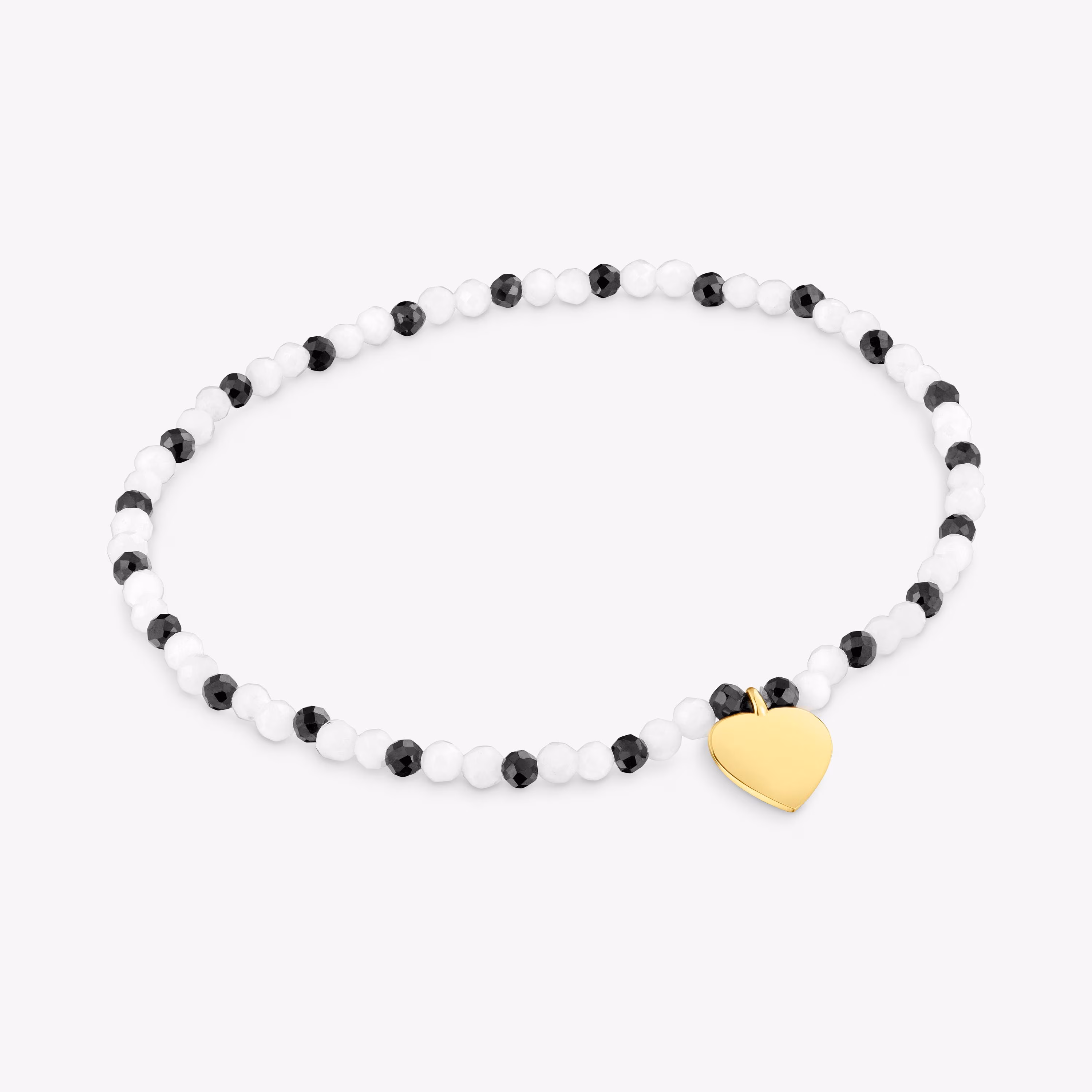 Pulsera elástica con calcedónia, espinelas y corazón con baño de oro 18 kt sobre plata TOUS Motivos