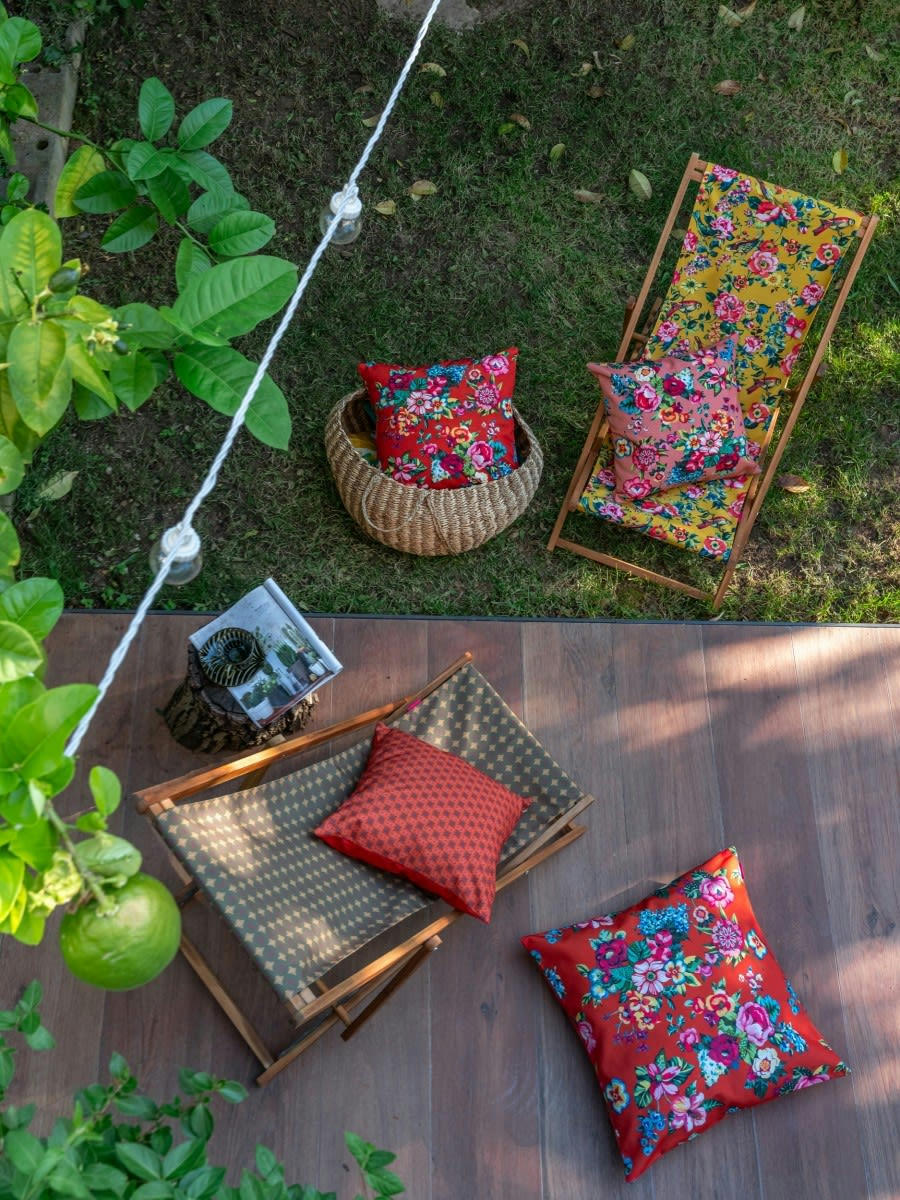 SHANTI - Housse de coussin extérieur fleuri orange 45x45