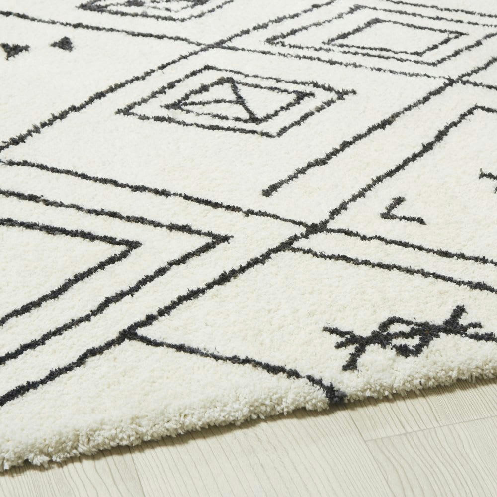 ELSU - Tapis style berbère tufté écru motifs graphiques noirs 140x200