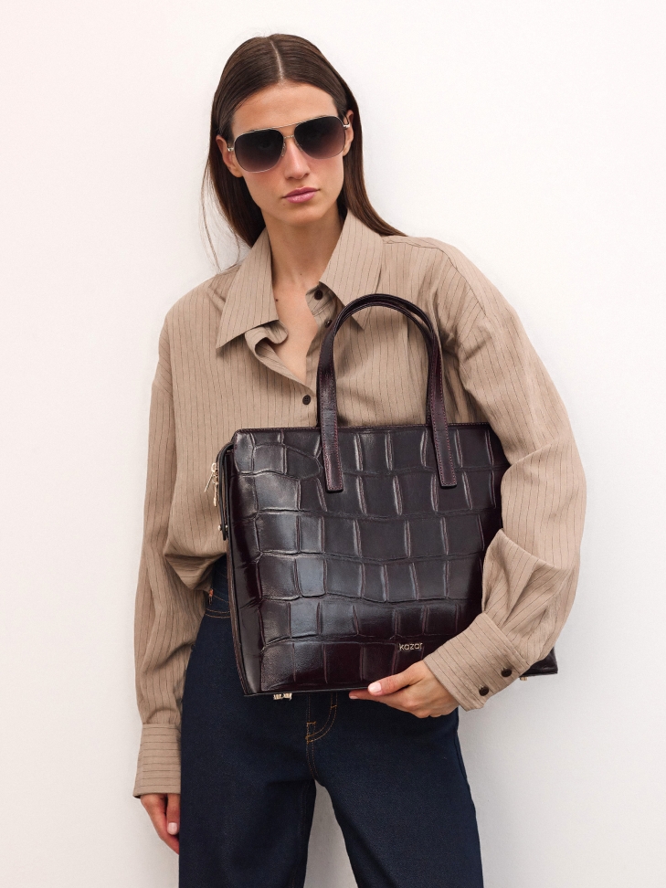 Maroon embossed leather handbag with case holder