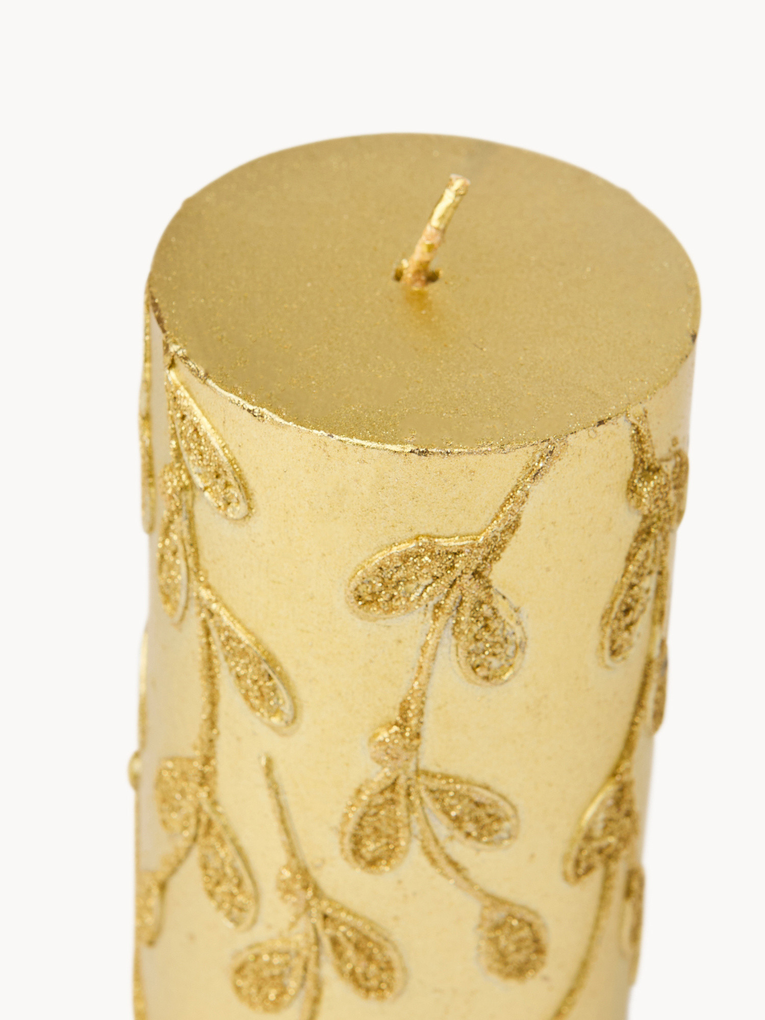 Candela con decorazioni glitter