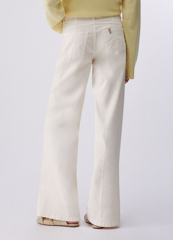 Pantaloni flare con cintura