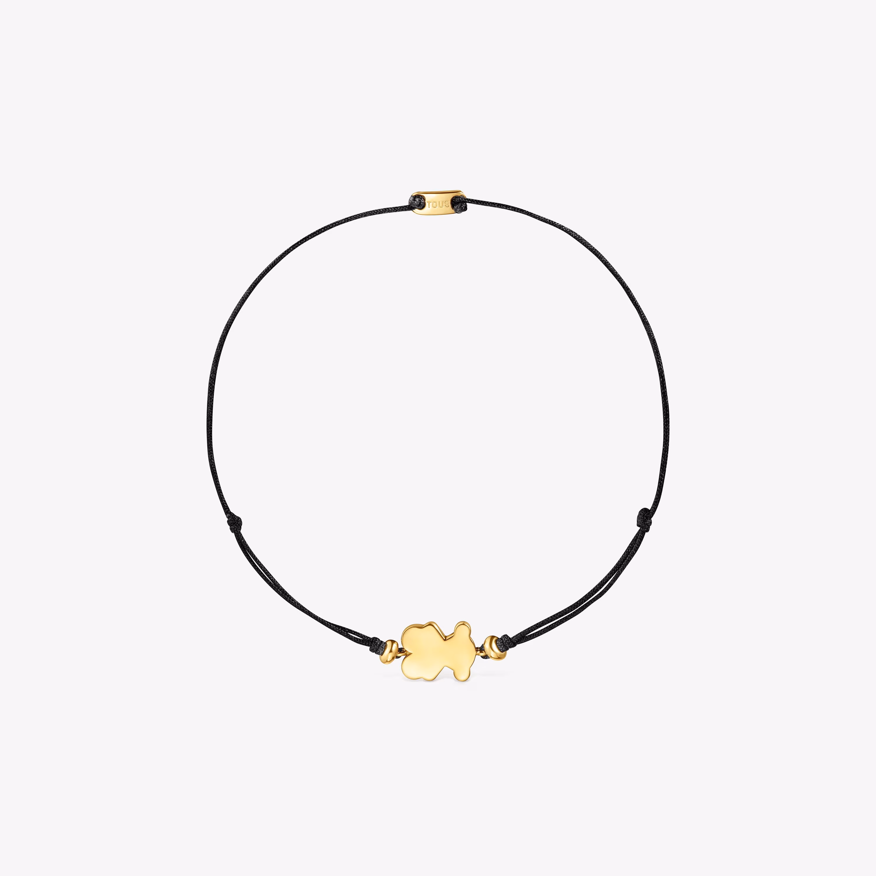 Pulsera con baño de oro 18 kt sobre plata y nylon negro con motivo oso Sweet Dolls