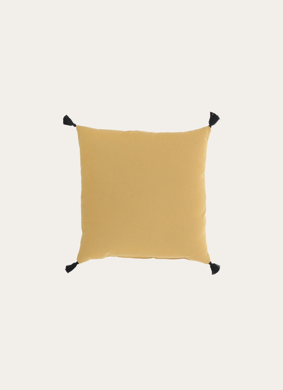 COUSSIN EN COTON UNI AVEC PETITS POMPONS MOUTARDE