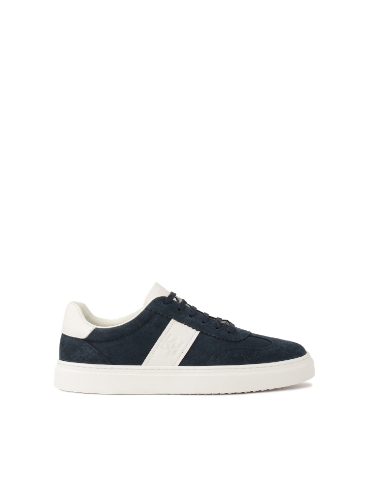 Navy blue and white suede sneakers