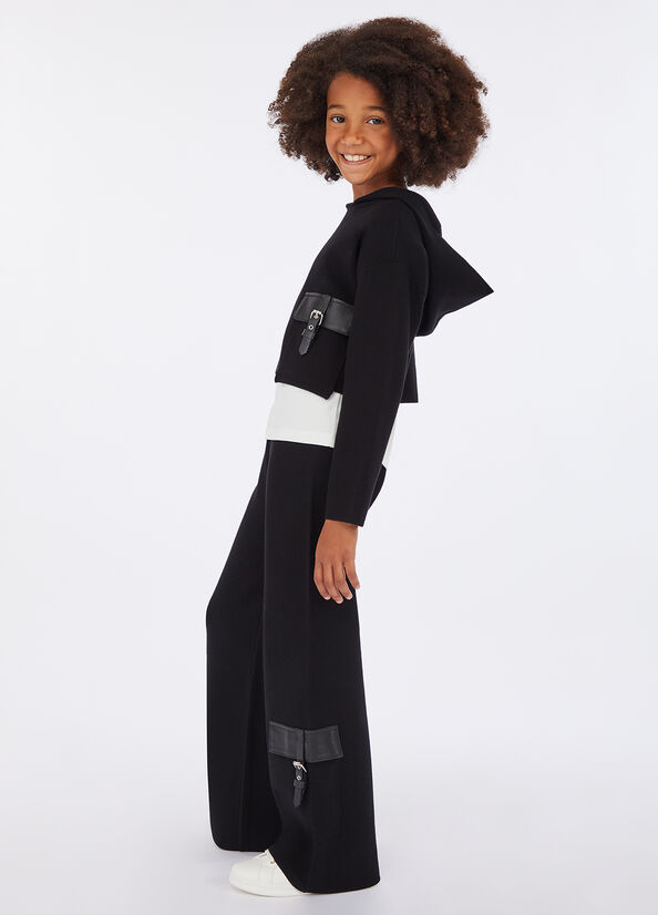 Pantaloni in maglia con fibbie