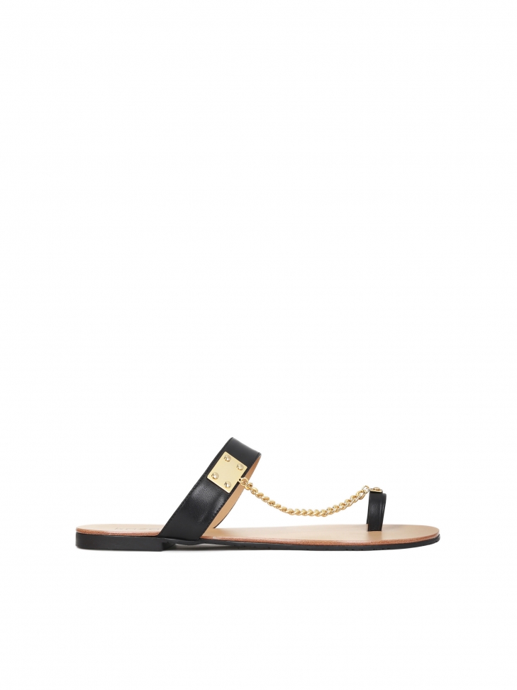Black leather slides with decorative chain detailing