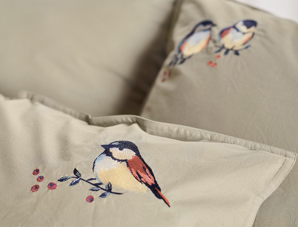 Linge de litMésanges