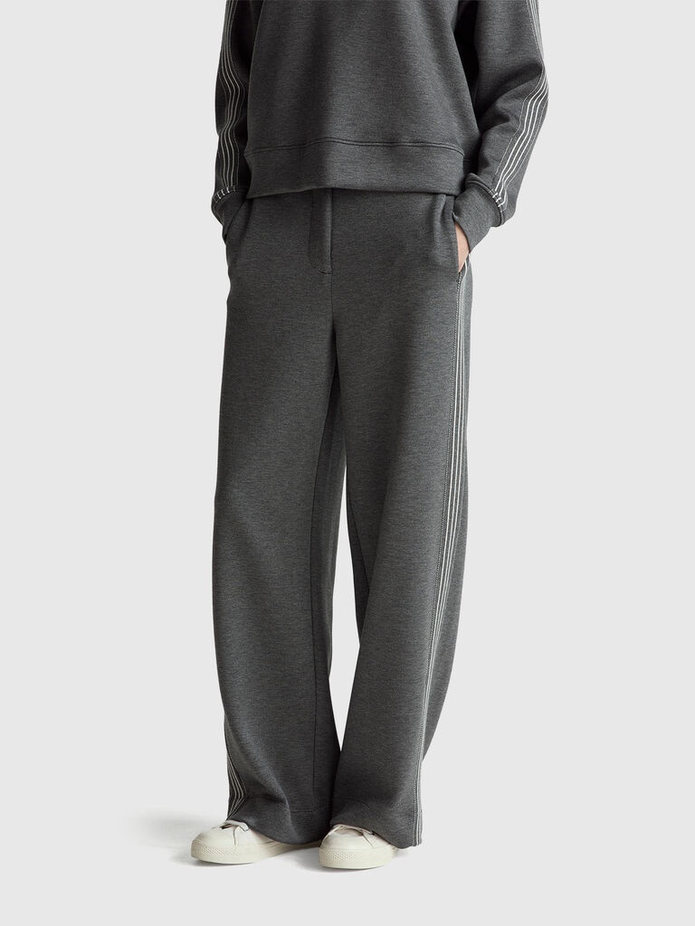 Wide trousers with side stripes