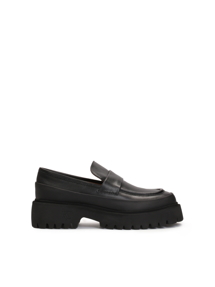 Leather shoes on a tractor sole