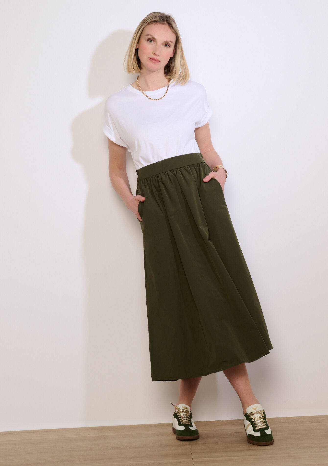 Lange rok met plooitaille