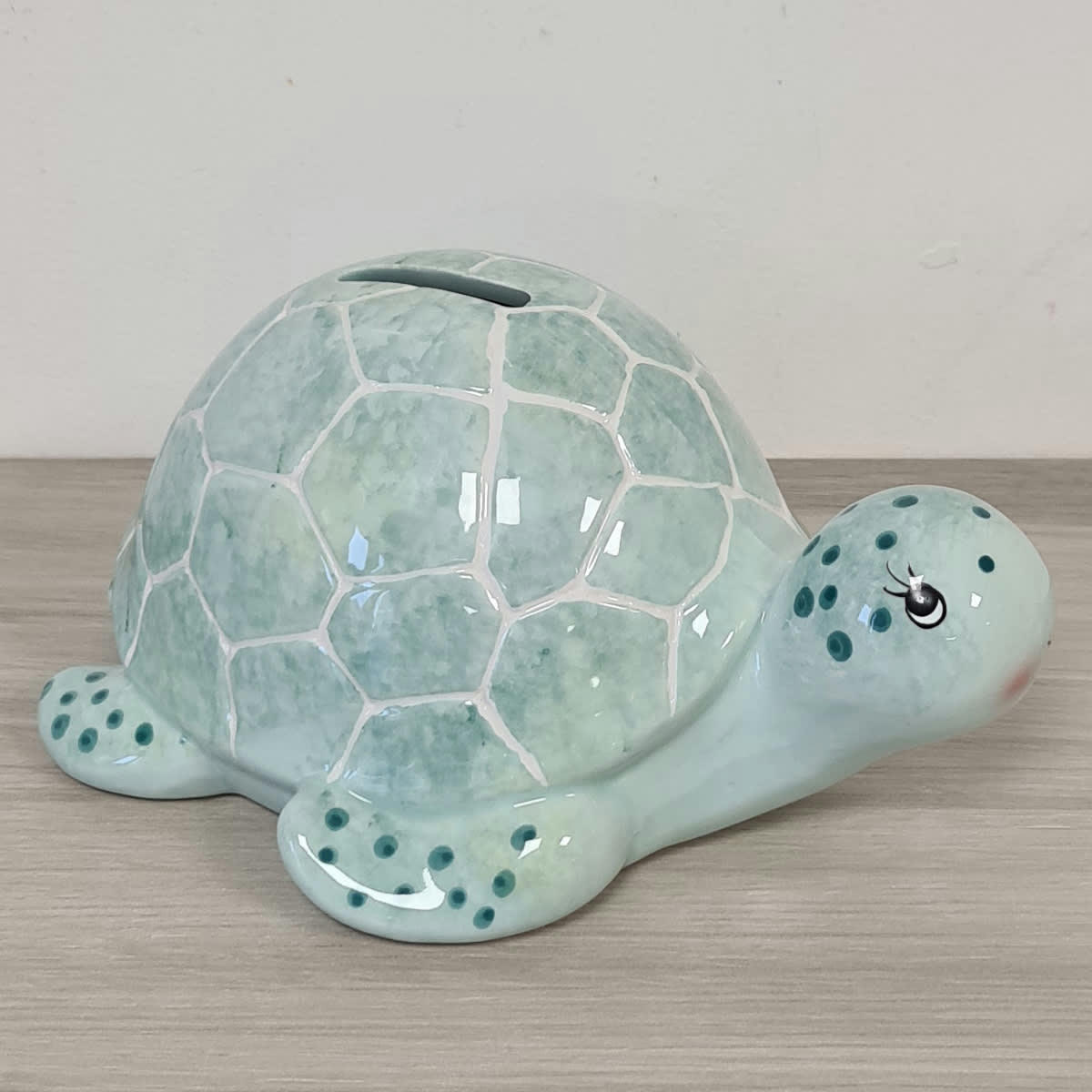- Tirelire tortue vert clair