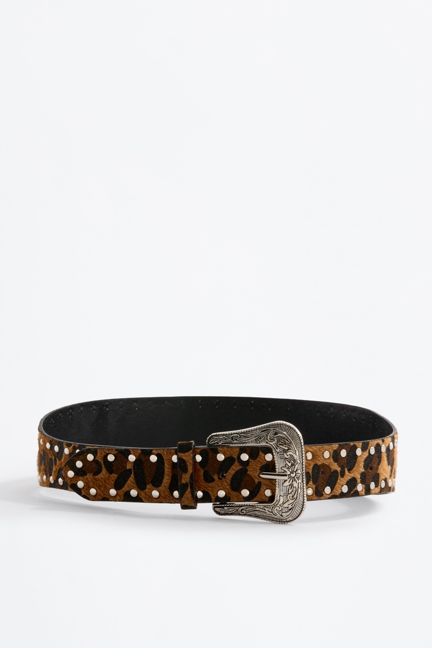 Cinturón animal print tachas