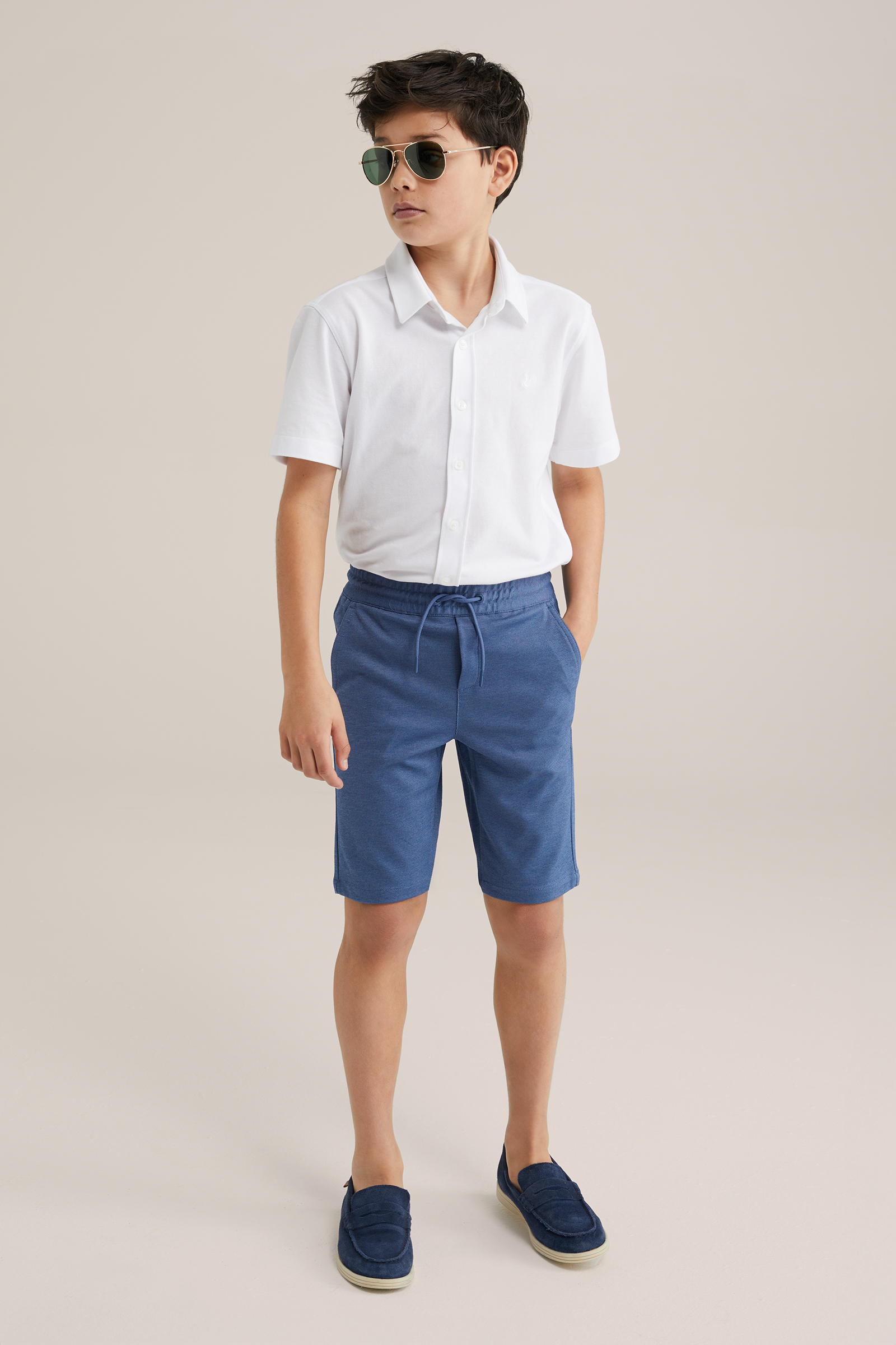 Jongens slim fit gem&ecirc;leerde short