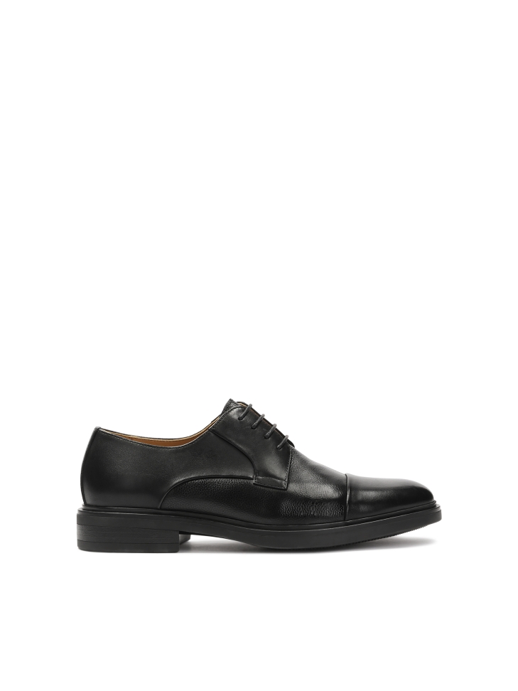 Black shoes with overlapping toes