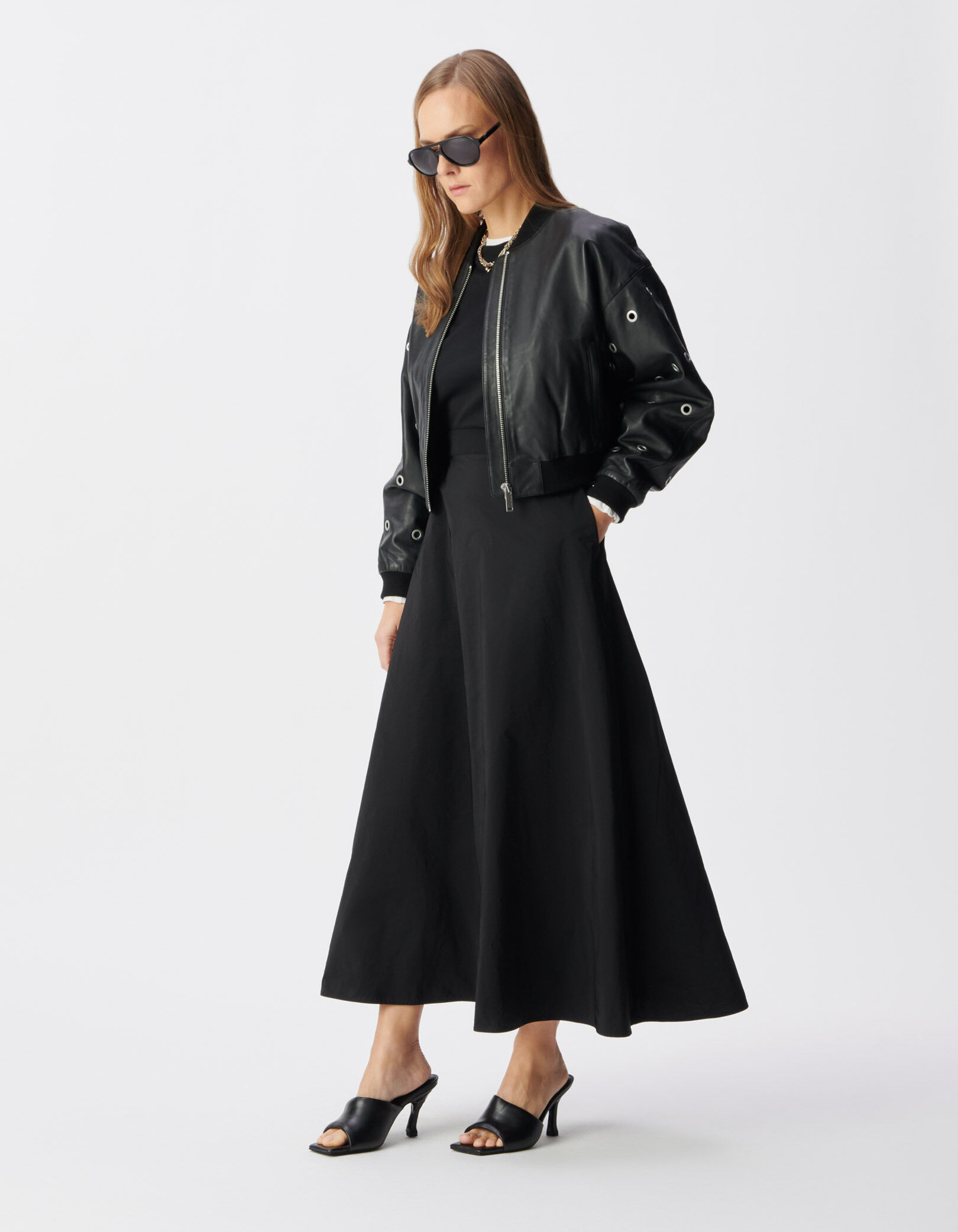 Bomber court noir cuir décor maxi oeillets Femme