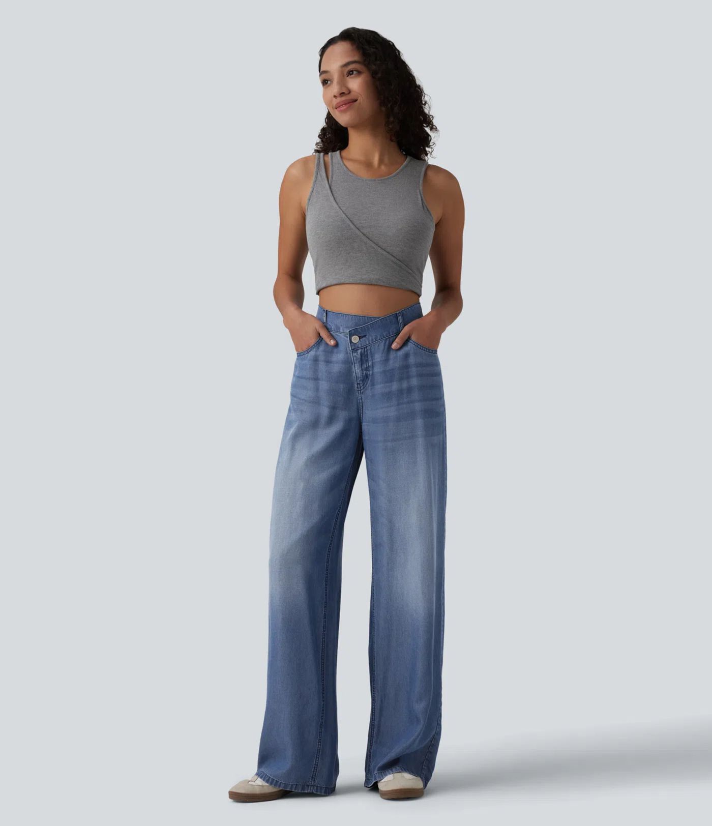 Jean large décontracté asymétrique en lyocell taille mi-haute drapé avec poches