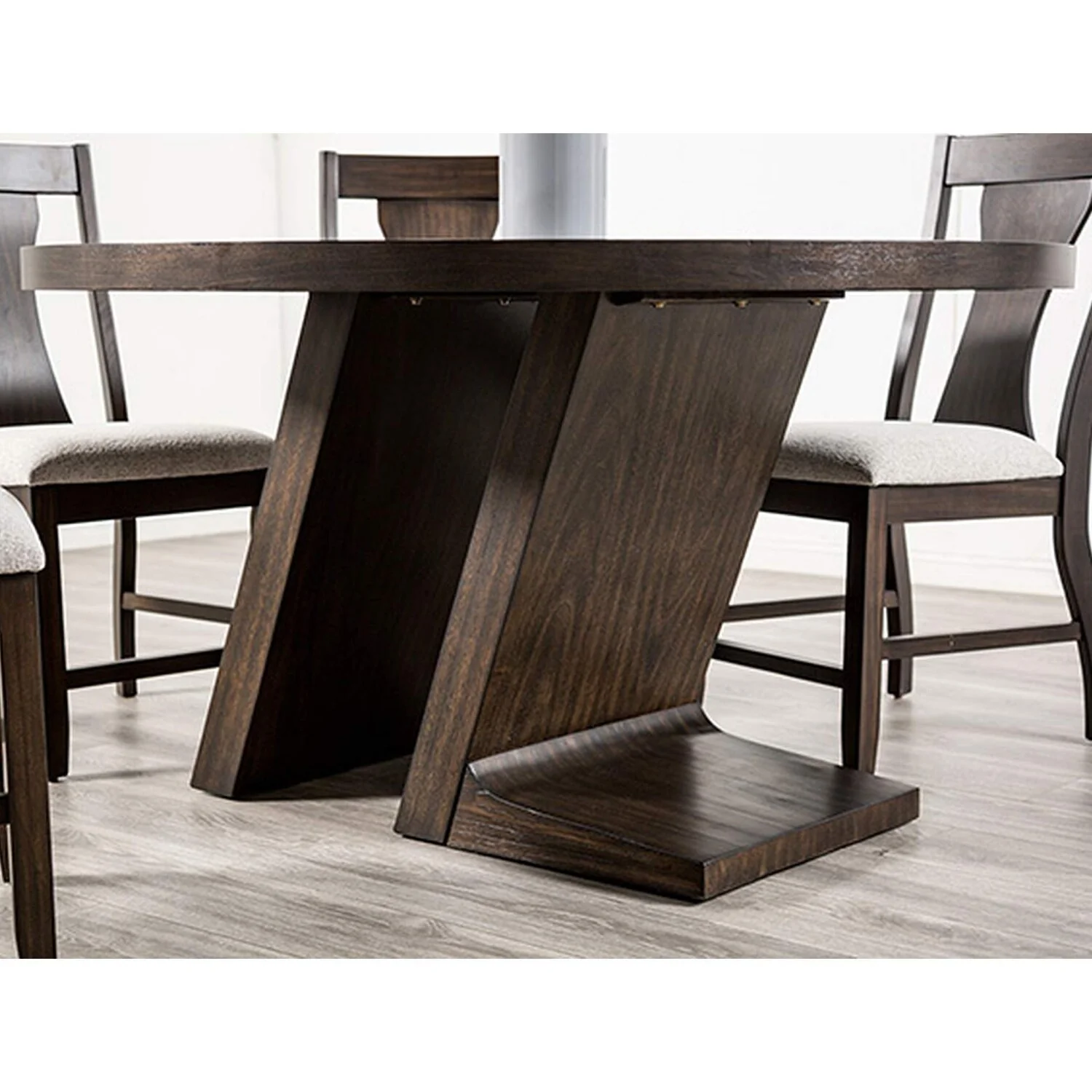 Round Wooden Dining Table with Angled Pedestal Legs in Espresso