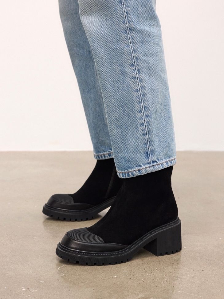 Black block ankle boots made of combined materials