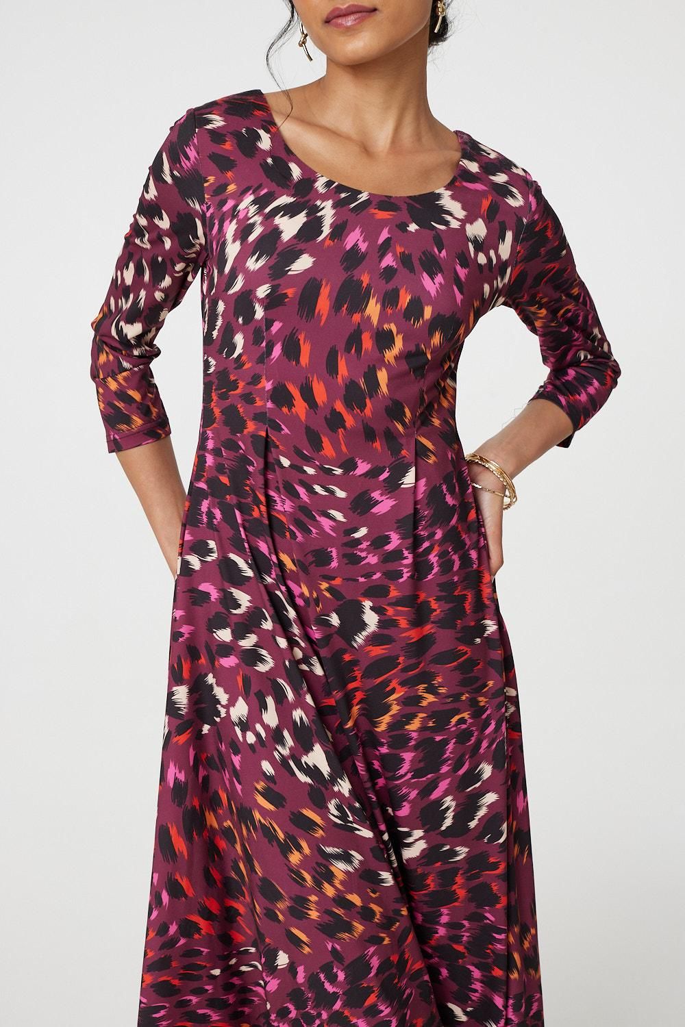 Izabel London Animal Print Hanky Hem Jersey Dress