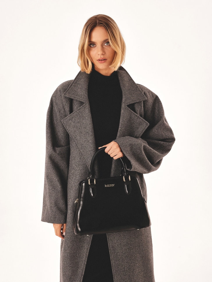 Black casual handbag for hand and shoulder